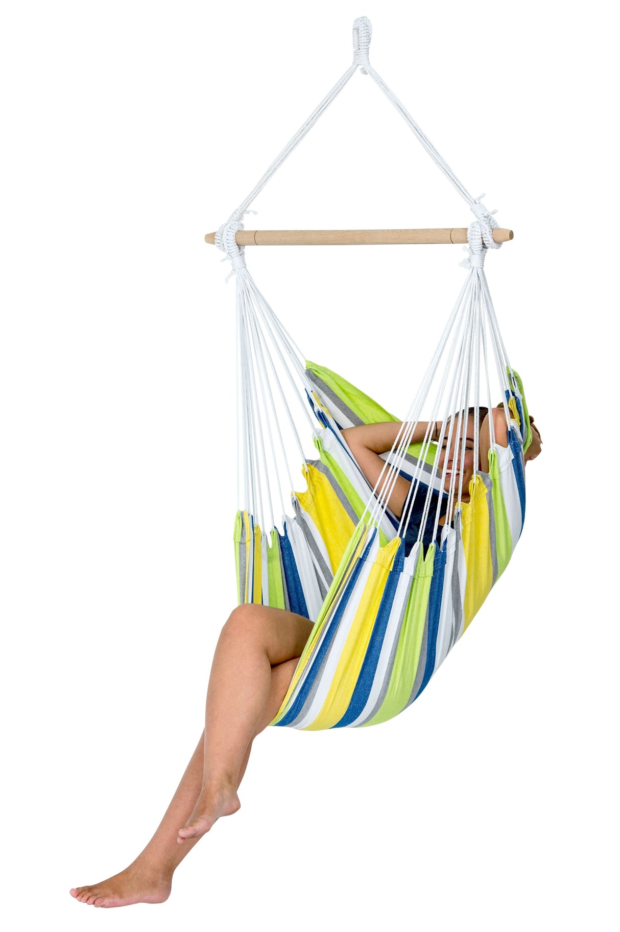 Person sitting in a colourful striped hammock chair on a white background
