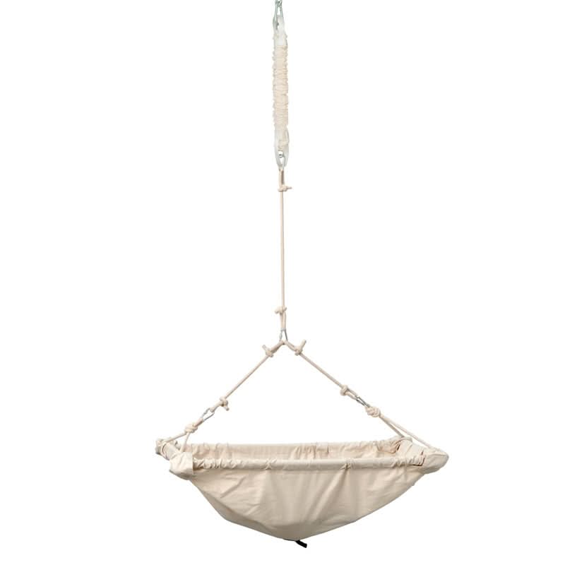 Beige hammock hanging against a white background
