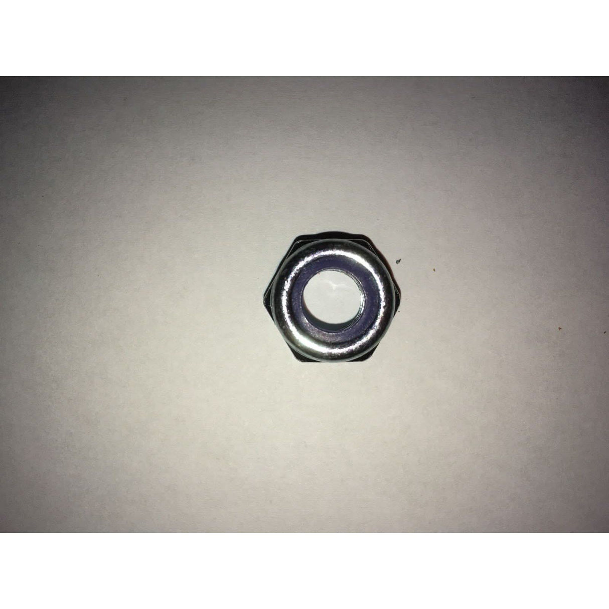 Metallic bolt on a grey background