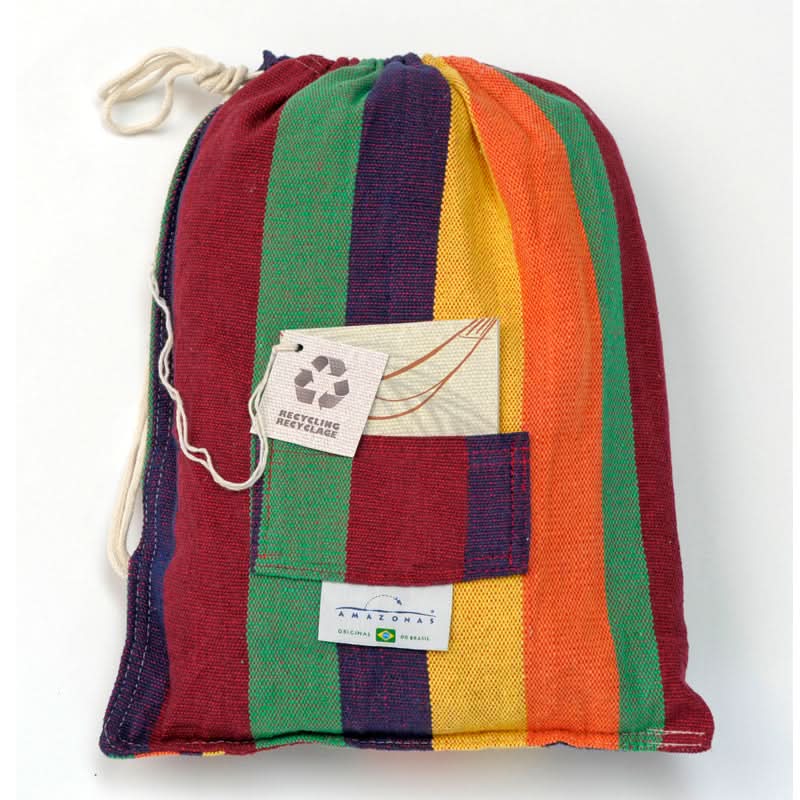 Colourful striped drawstring bag with labels on a white background
