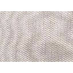 Close-up of a textured beige fabric swatch