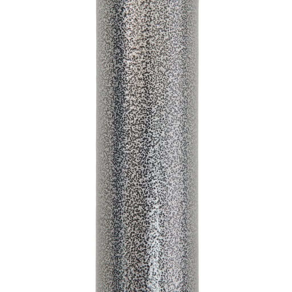 Silver glittery cylindrical object on a white background