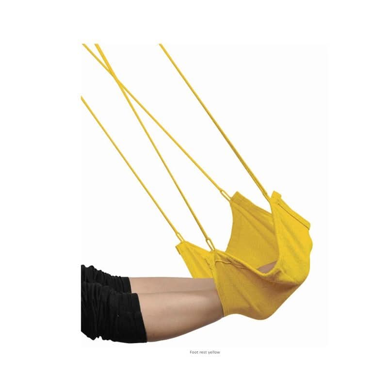 Yellow hammock swing with a person's legs in black shorts and beige stockings on a white background.