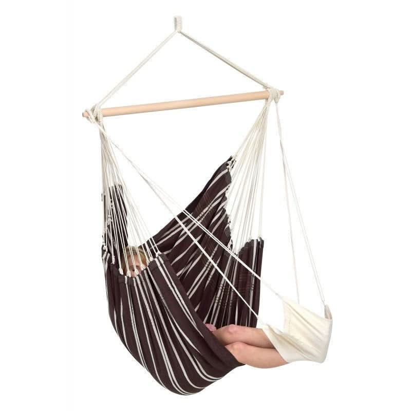 Brown and white striped hammock chair with wooden rod on a white background