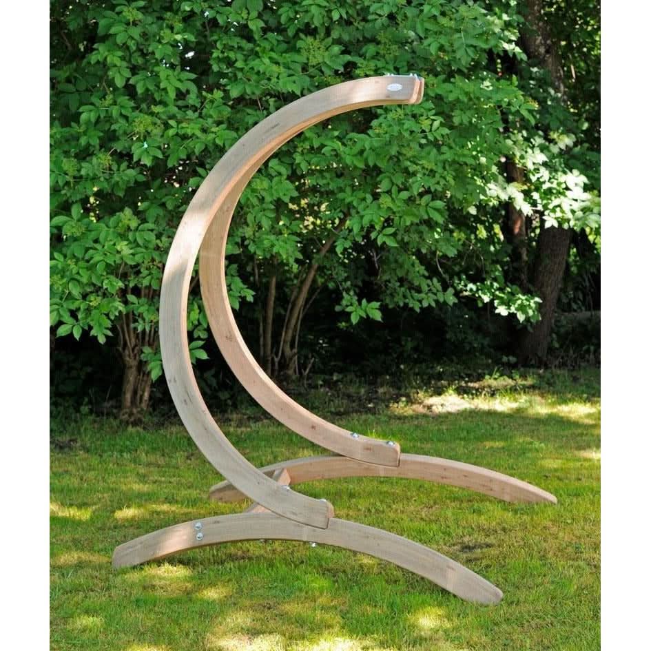 Wooden crescent moon stand in a garden setting