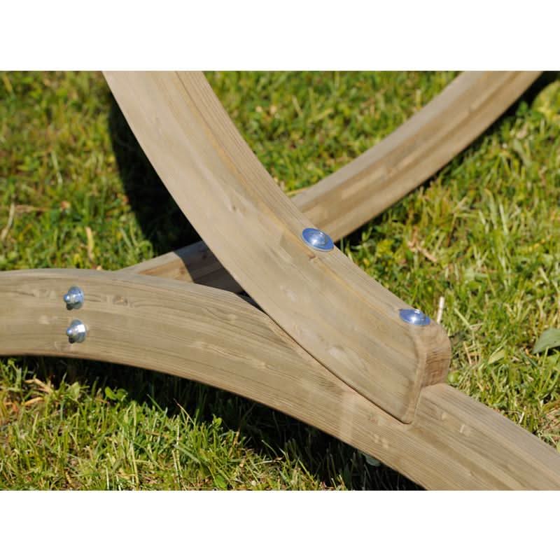 Wooden wheelbarrow on grass