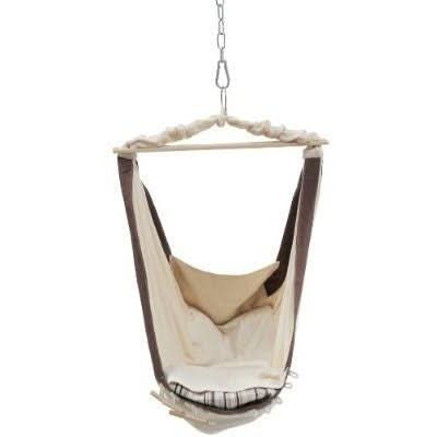 Hanging chair with beige seat and brown frame on a white background