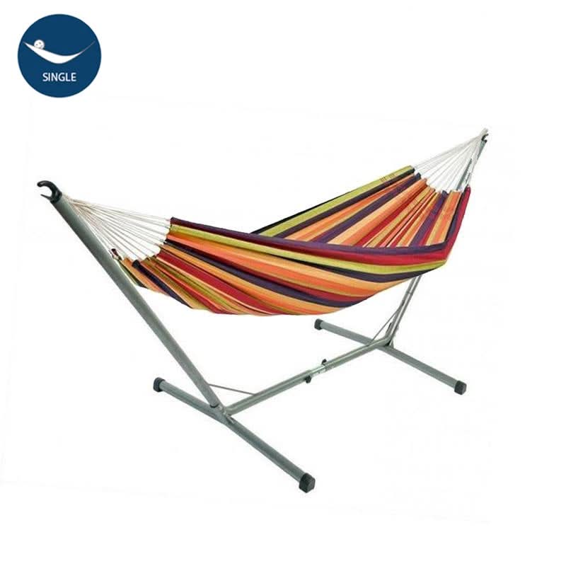 Colourful striped hammock with a stand on a white background