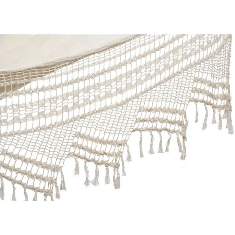 Beige woven blanket with tassels on a white background