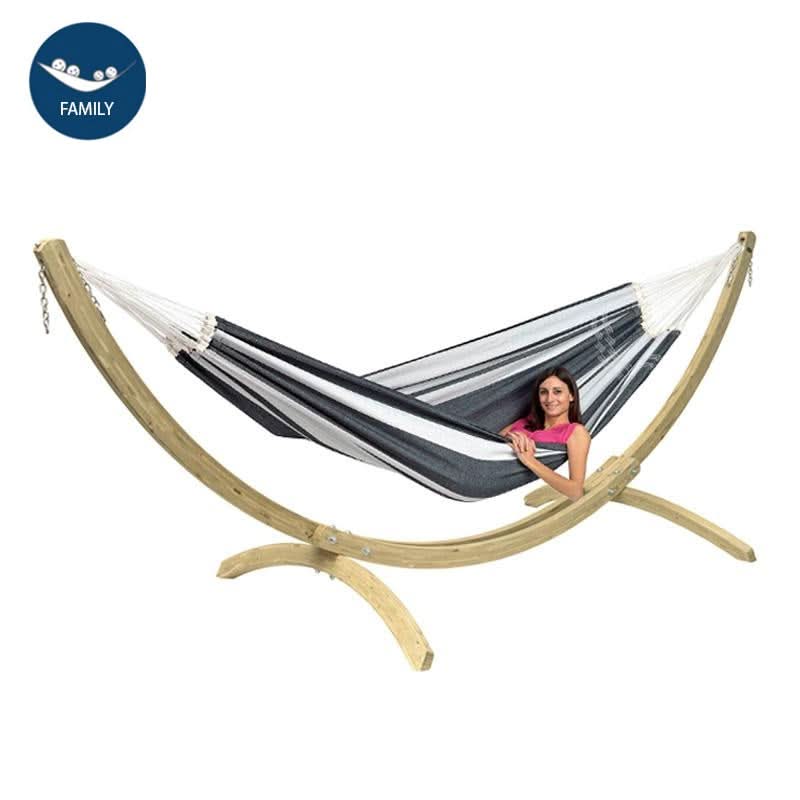 Hammock with wooden stand and a person sitting inside on a white background