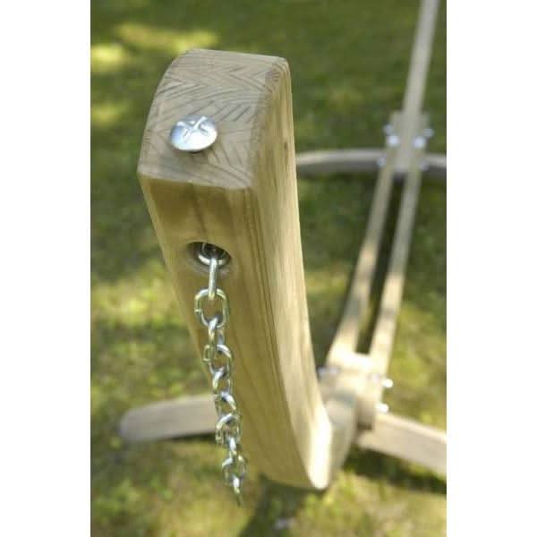 Wooden post with a chain attached, likely part of a swing set, on a grassy background.