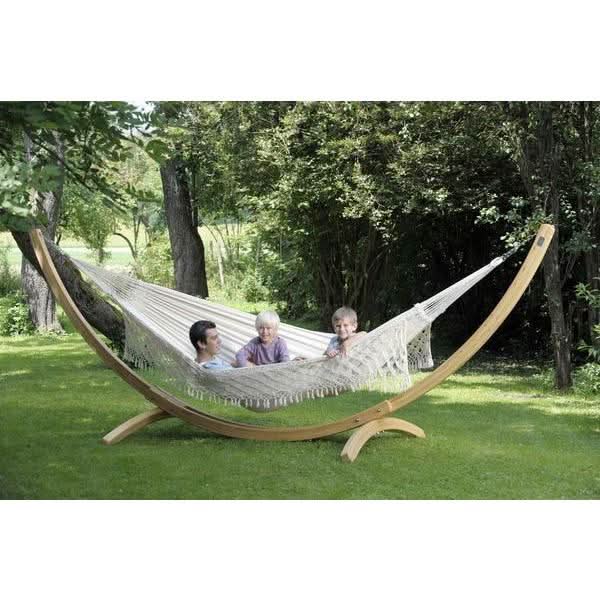 Hammock with wooden stand in a garden setting