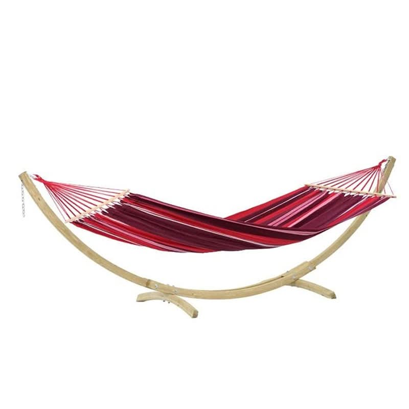 Red hammock on a wooden stand against a white background