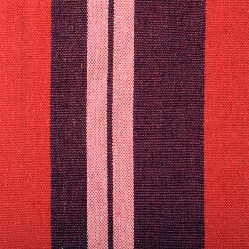 Close-up of fabric with red, purple, and pink stripes.