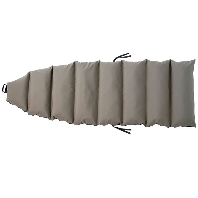 Foldable beige sleeping pad on a white background