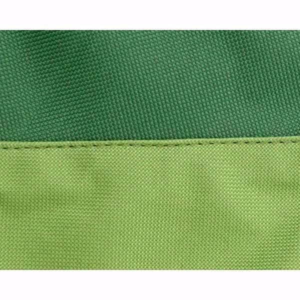 Close-up of green fabric with a ribbed texture