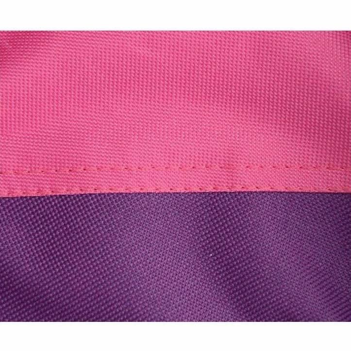 Close-up of pink and purple fabric with a textured pattern
