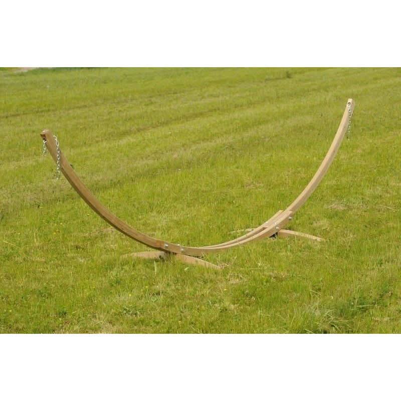 Wooden hammock stand on a grassy field