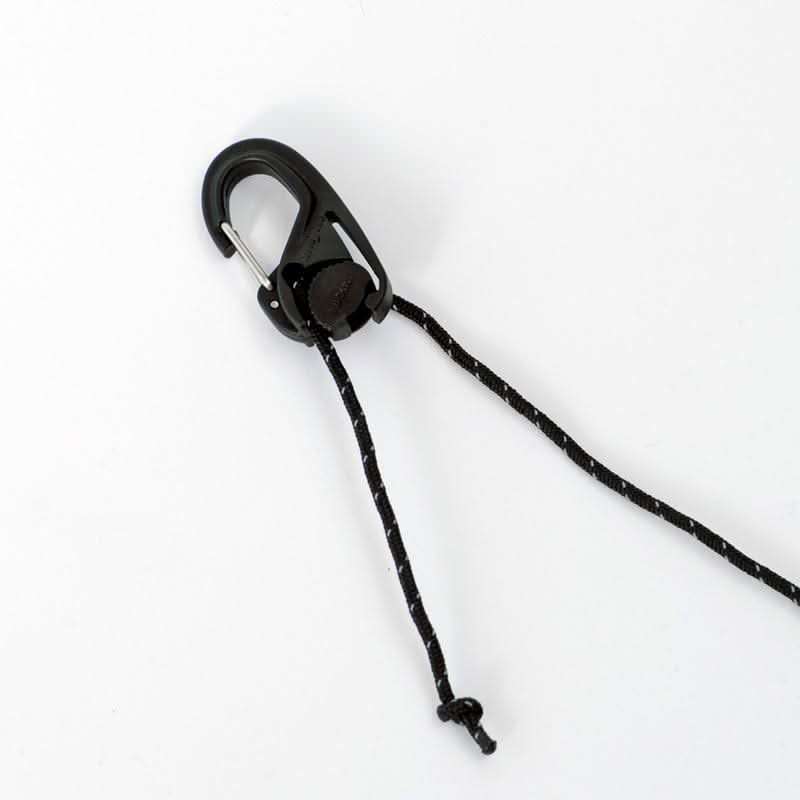Black carabiner with a rope on a white background