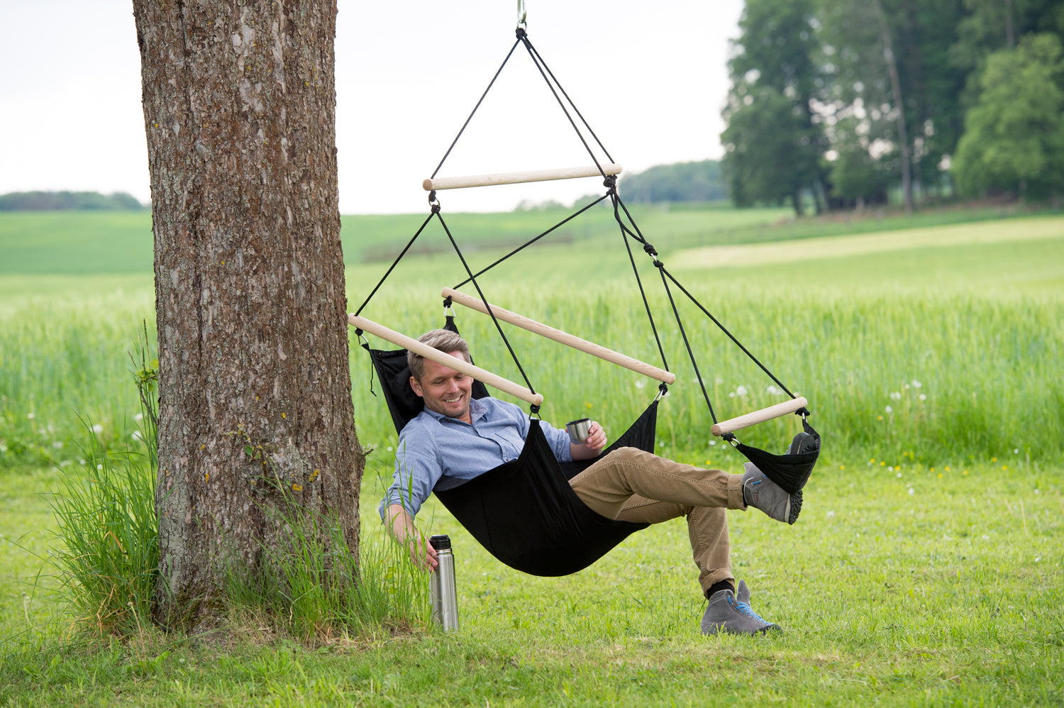 Swinger Black Hammock Chair From a Tree
