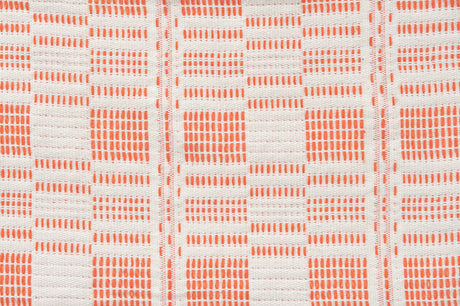 Patterned fabric with orange and white checkered design