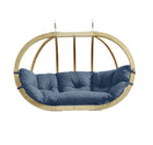 Hanging chair with a blue cushion on a white background