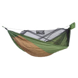 Green and brown camping hammock with mosquito net on a white background