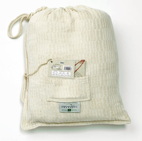 Beige drawstring bag with a pocket on a white background