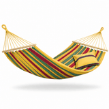 A striped fabric hammock with yellow, red, and green bands, suspended between two wooden spreader bars with yellow ropes. A matching yellow pillow with red and blue stripes rests inside the hammock against a clean white background.