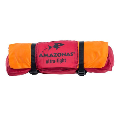 Red and orange ultra-lightAmazonas bag on a white background