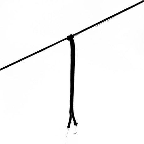 Black cord with a knot on a white background