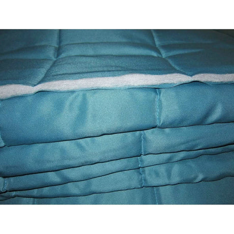 Stack of blue fabric with white trim on a white background