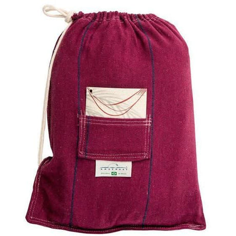 Red drawstring bag with a pocket and visible brand label on a white background