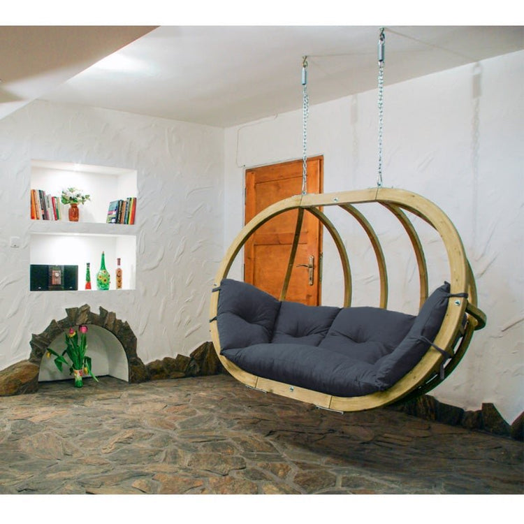 Spruce wood oval shaped hanging chair, metal fixing points, with anthracite coloured seat pillows