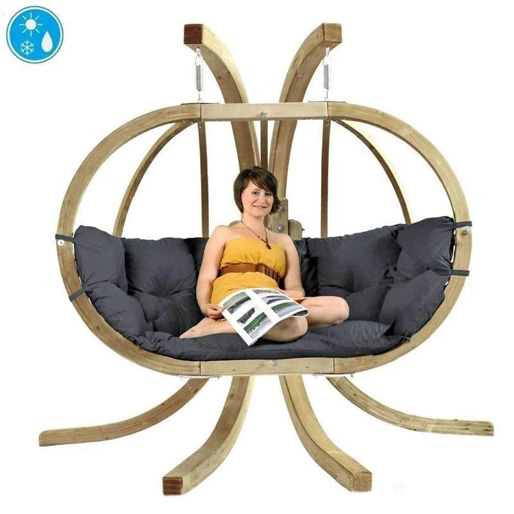 Spruce wood oval shaped hanging chair, metal fixing points, with anthracite coloured seat pillows