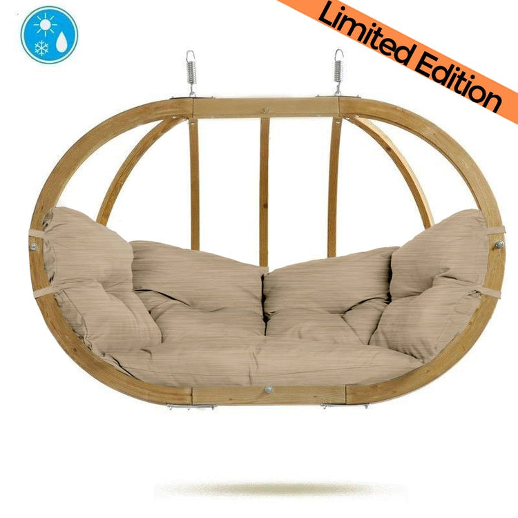 Amazonas spruce wood oval shaped Globo hanging chair, metal fixing points, with sand coloured seat pillows