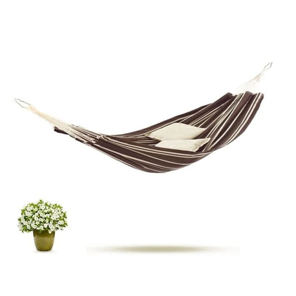 Brown and white striped hammock with a potted plant on a white background