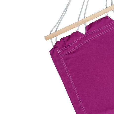 Purple hammock with wooden rod on a white background