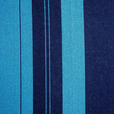 Close-up of blue and navy striped fabric with visible stitching.