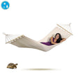 Beige hammock with a person relaxing on a white background, featuring a turtle and water droplet icon.