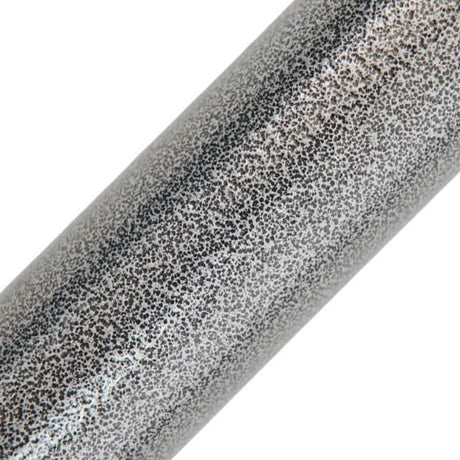 Close-up of a cylindrical object with a textured surface on a white background