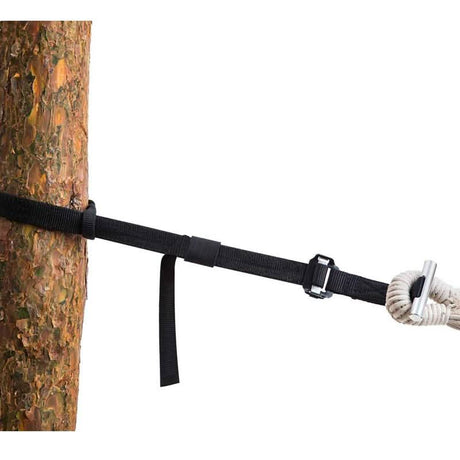 Black strap with a rope attached, wrapped around a tree on a white background