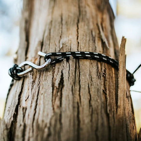Bracelet with a metal clasp on a wooden surface