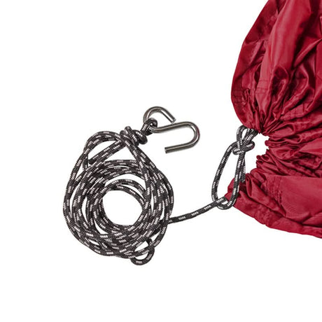 Red canopy with a coiled rope and metal hook on a white background